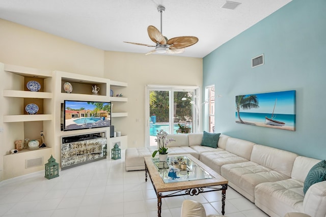 19262 Redberry Ct, Boca Raton, FL 33498 - living area featuring a ceiling fan, vaulted ceiling, and built in shelves