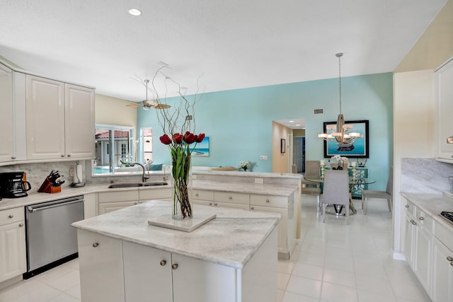 19262 Redberry Ct, Boca Raton, FL 33498 - kitchen featuring dishwasher, a peninsula, a kitchen island, a chandelier, and a sink