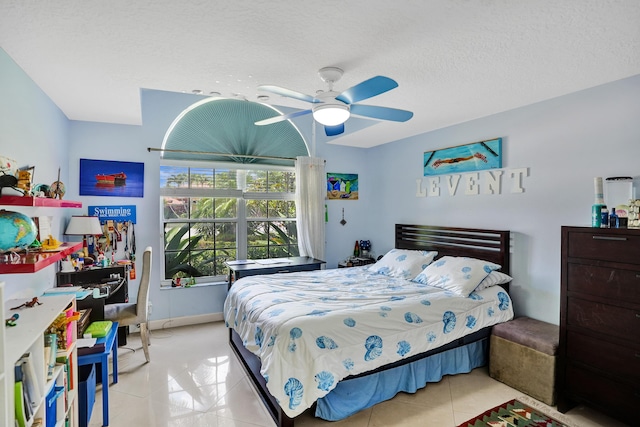 19262 Redberry Ct, Boca Raton, FL 33498 - tiled bedroom featuring a textured ceiling, a ceiling fan, and baseboards