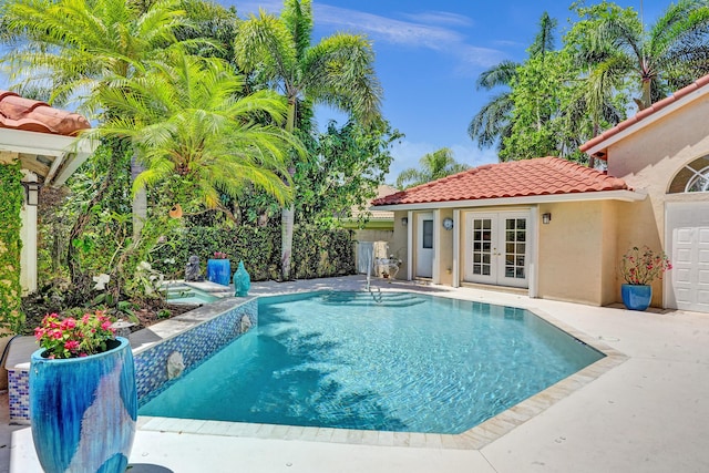19262 Redberry Ct, Boca Raton, FL 33498 - view of pool with french doors and an in-ground hot tub