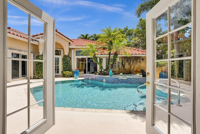 19262 Redberry Ct, Boca Raton, FL 33498 - view of pool featuring a patio and a pool with connected hot tub