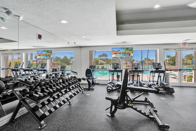 19262 Redberry Ct, Boca Raton, FL 33498 - gym with french doors, healthy amount of natural light, a textured ceiling, and recessed lighting