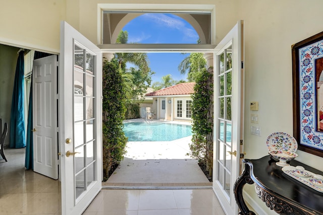 19262 Redberry Ct, Boca Raton, FL 33498 - doorway featuring french doors, tile patterned flooring, and healthy amount of natural light