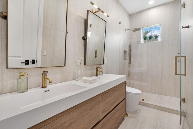 full bath featuring a shower stall, toilet, and double vanity