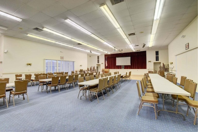 view of carpeted dining area
