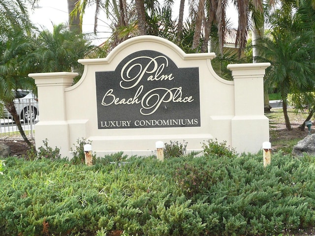 community sign featuring fence