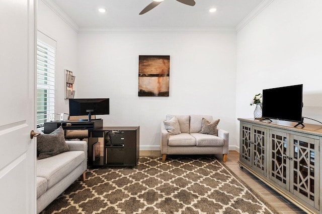 962 Castaway Ct, Loxahatchee, FL 33470 - living room with wood finished floors, ceiling fan, ornamental molding, a desk, and baseboards