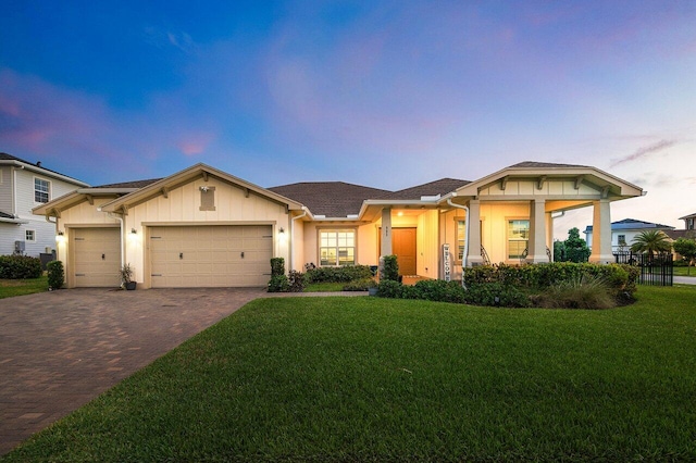 962 Castaway Ct, Loxahatchee, FL 33470 - view of front facade with decorative driveway and a garage