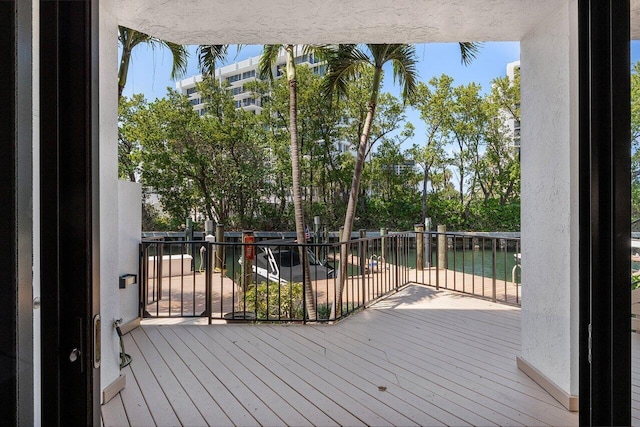 4401 N Ocean Blvd Unit 12, Boca Raton, FL 33431 - wooden deck with a water view
