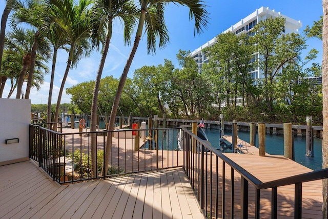 4401 N Ocean Blvd Unit 12, Boca Raton, FL 33431 - wooden deck with a water view and a dock