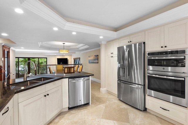 4401 N Ocean Blvd Unit 12, Boca Raton, FL 33431 - kitchen with appliances with stainless steel finishes, a raised ceiling, a sink, crown molding, and recessed lighting