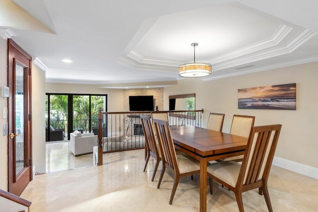 4401 N Ocean Blvd Unit 12, Boca Raton, FL 33431 - dining area featuring ornamental molding, a tray ceiling, baseboards, and recessed lighting