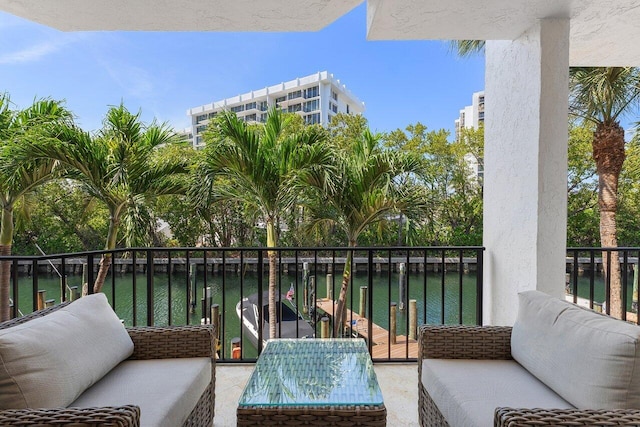 4401 N Ocean Blvd Unit 12, Boca Raton, FL 33431 - balcony with a water view and an outdoor hangout area