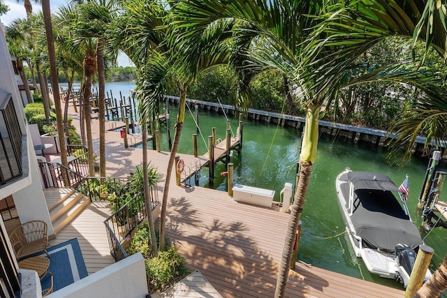 4401 N Ocean Blvd Unit 12, Boca Raton, FL 33431 - dock with a water view and boat lift