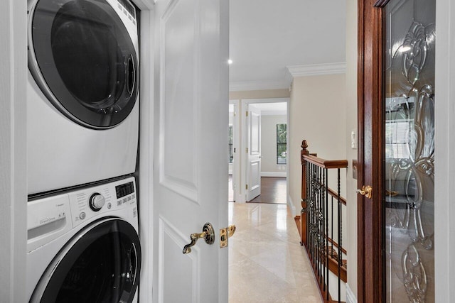4401 N Ocean Blvd Unit 12, Boca Raton, FL 33431 - laundry area featuring stacked washer and clothes dryer and ornamental molding
