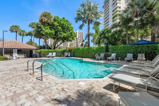 4401 N Ocean Blvd Unit 12, Boca Raton, FL 33431 - community pool with a patio area and fence