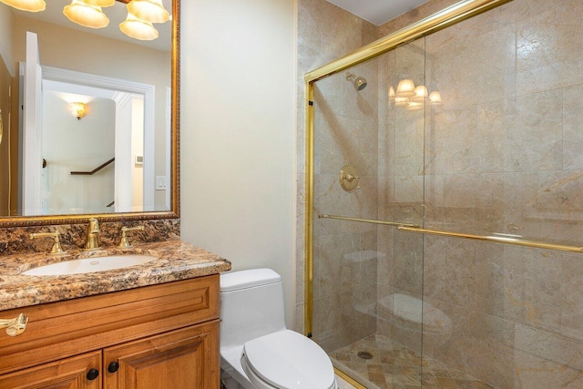 4401 N Ocean Blvd Unit 12, Boca Raton, FL 33431 - full bathroom featuring toilet, a shower stall, and vanity