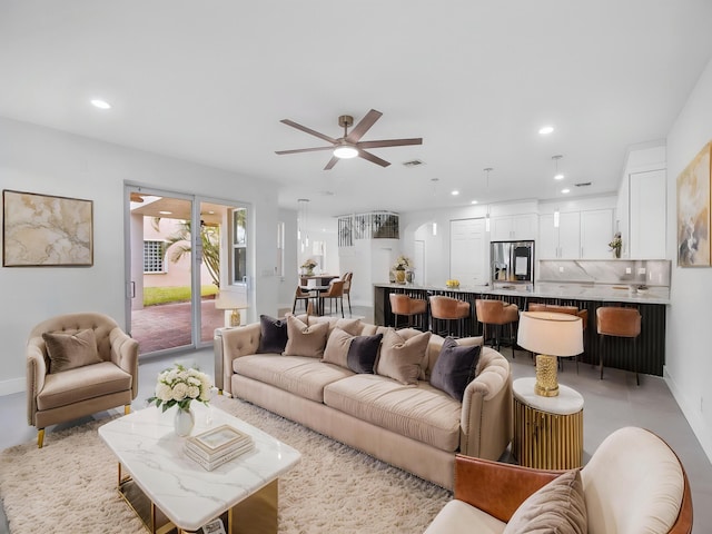 7285 Via Luria, Lake Worth, FL 33467 - living room featuring visible vents, baseboards, ceiling fan, and recessed lighting