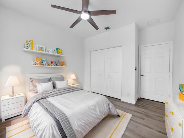 7285 Via Luria, Lake Worth, FL 33467 - bedroom with wood finished floors, a ceiling fan, a closet, visible vents, and baseboards