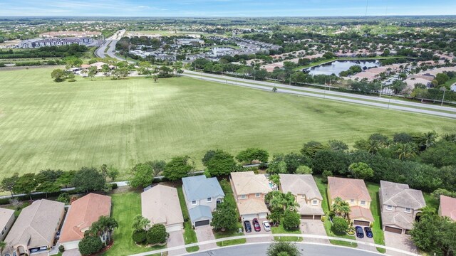 7285 Via Luria, Lake Worth, FL 33467 - bird's eye view featuring a water view and a residential view