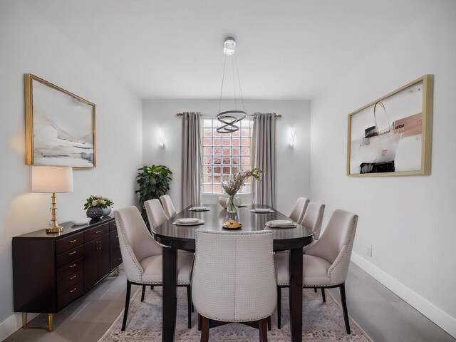 7285 Via Luria, Lake Worth, FL 33467 - dining room featuring baseboards