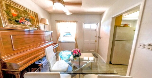 dining area featuring baseboards