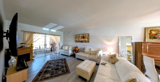 living area with wood finished floors