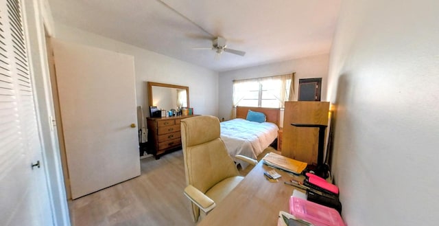bedroom featuring wood finished floors and ceiling fan