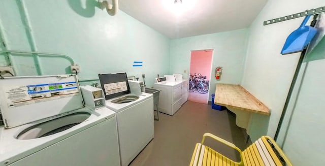 laundry area featuring separate washer and dryer