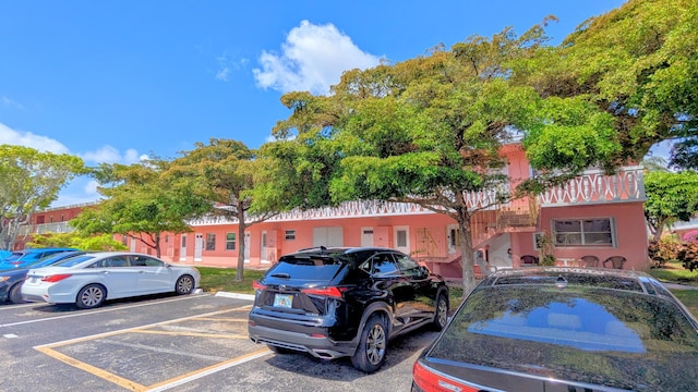 view of front of home featuring uncovered parking