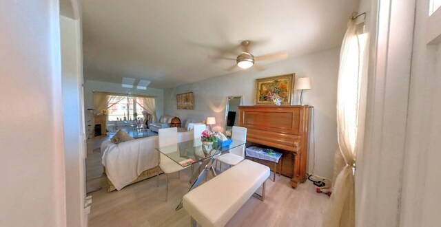 bedroom featuring wood finished floors and a ceiling fan
