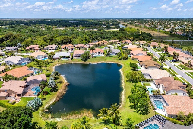 aerial perspective of suburban area featuring a large body of water