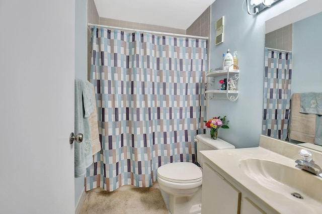 6235 Kings Gate Cir Unit C, Delray Beach, FL 33484 - bathroom featuring toilet, vanity, and a shower with curtain