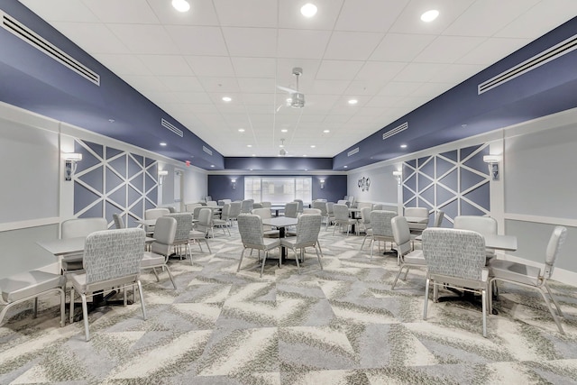 6235 Kings Gate Cir Unit C, Delray Beach, FL 33484 - dining space with carpet floors and a decorative wall