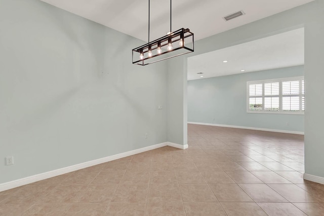 1500 Mariner Bay Blvd Unit 1500, Fort Pierce, FL 34949 - unfurnished room with a chandelier, light tile patterned floors, baseboards, and recessed lighting