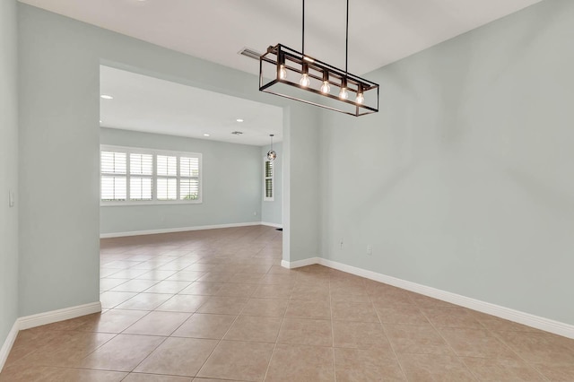 1500 Mariner Bay Blvd Unit 1500, Fort Pierce, FL 34949 - unfurnished dining area featuring light tile patterned floors, a chandelier, recessed lighting, and baseboards