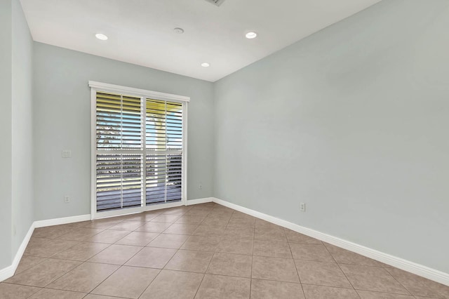 1500 Mariner Bay Blvd Unit 1500, Fort Pierce, FL 34949 - tiled spare room featuring baseboards and recessed lighting