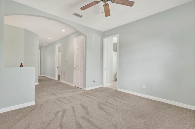 1500 Mariner Bay Blvd Unit 1500, Fort Pierce, FL 34949 - spare room with ceiling fan, arched walkways, carpet flooring, baseboards, and recessed lighting
