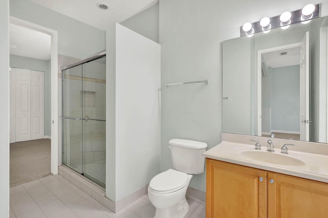 1500 Mariner Bay Blvd Unit 1500, Fort Pierce, FL 34949 - bathroom with a shower stall, toilet, tile patterned flooring, and vanity
