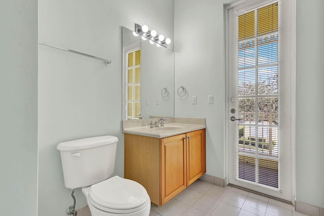 1500 Mariner Bay Blvd Unit 1500, Fort Pierce, FL 34949 - bathroom with tile patterned floors, toilet, vanity, and baseboards