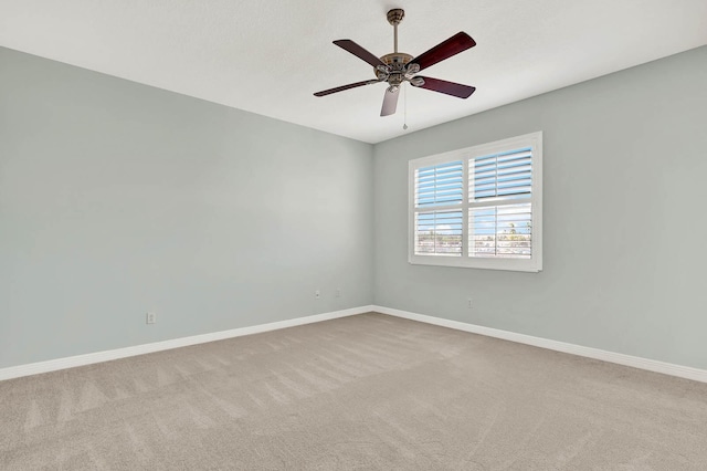 1500 Mariner Bay Blvd Unit 1500, Fort Pierce, FL 34949 - spare room featuring carpet, ceiling fan, and baseboards