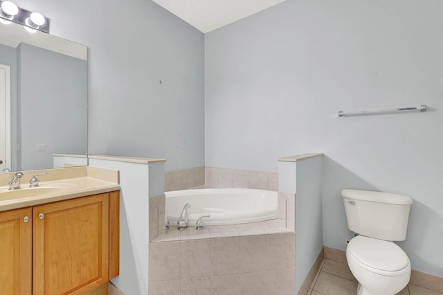 1500 Mariner Bay Blvd Unit 1500, Fort Pierce, FL 34949 - bathroom with tile patterned floors, vanity, a garden tub, toilet, and baseboards