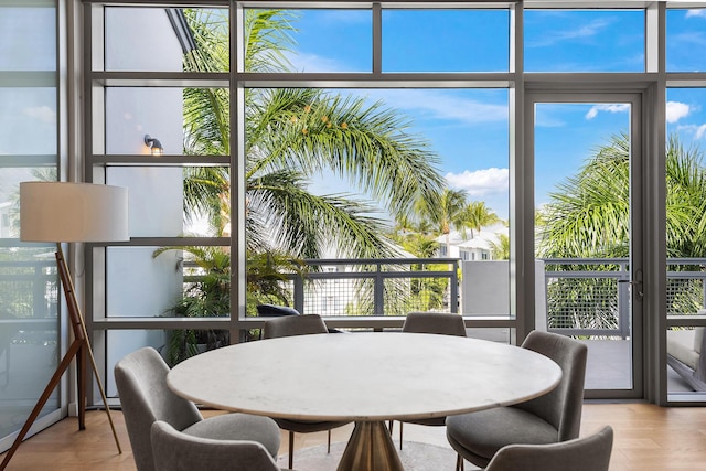 sunroom / solarium featuring plenty of natural light