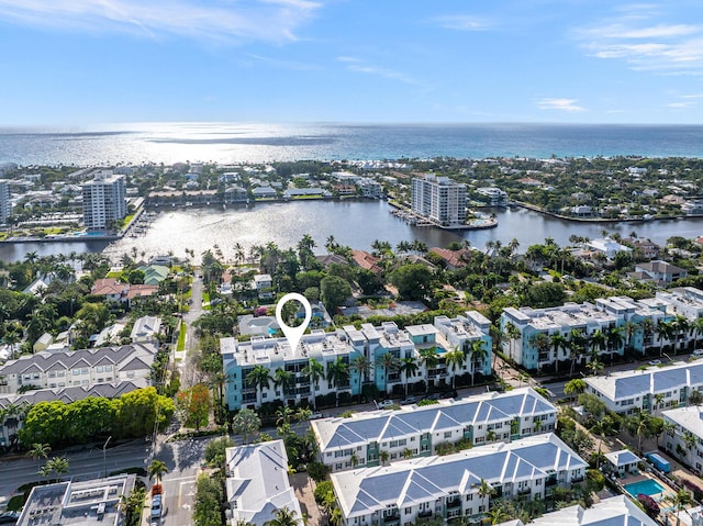 bird's eye view with a water view and a residential view