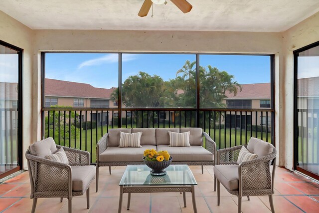 sunroom with plenty of natural light and tile patterned flooring