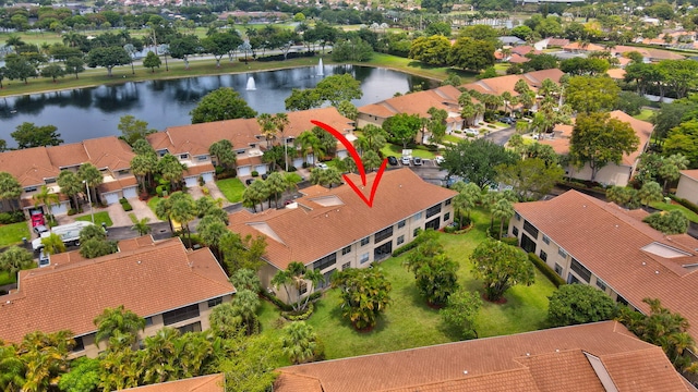 aerial perspective of suburban area with a large body of water