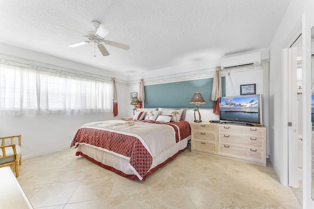 1470 S Ocean Blvd Unit 1201, Lauderdale By The Sea, FL 33062 - bedroom featuring a wall mounted air conditioner, a textured ceiling, and ceiling fan