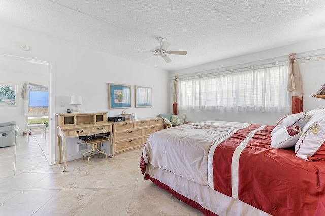 1470 S Ocean Blvd Unit 1201, Lauderdale By The Sea, FL 33062 - bedroom with a textured ceiling, light tile patterned floors, and ceiling fan