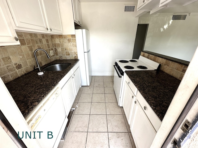 817 Lighthouse Dr Unit A, B, C, D, North Palm Beach, FL 33408 - kitchen with white appliances, a sink, tasteful backsplash, baseboards, and light tile patterned flooring