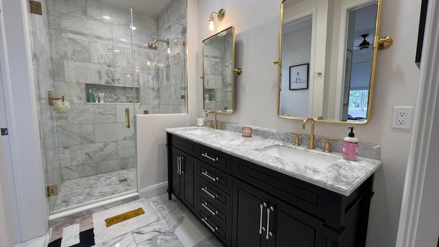203 Evergrene Pkwy, Palm Beach Gardens, FL 33410 - full bathroom featuring marble look tile flooring, a stall shower, and double vanity